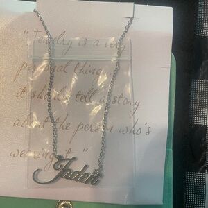 Sterling Silver Name Plate that says “Jaden”